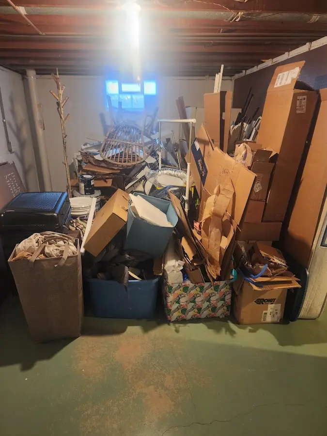 Roll-off dumpster container at job site for 4 Yard Dumpster Rental in Janesville